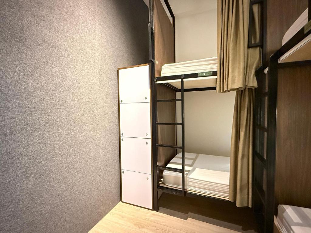 Postel nebo postele na pokoji v ubytování Jiran Hostel Kota Kinabalu