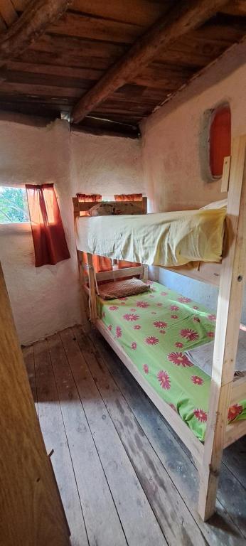 Postel nebo postele na pokoji v ubytování Baubo Ecocasa