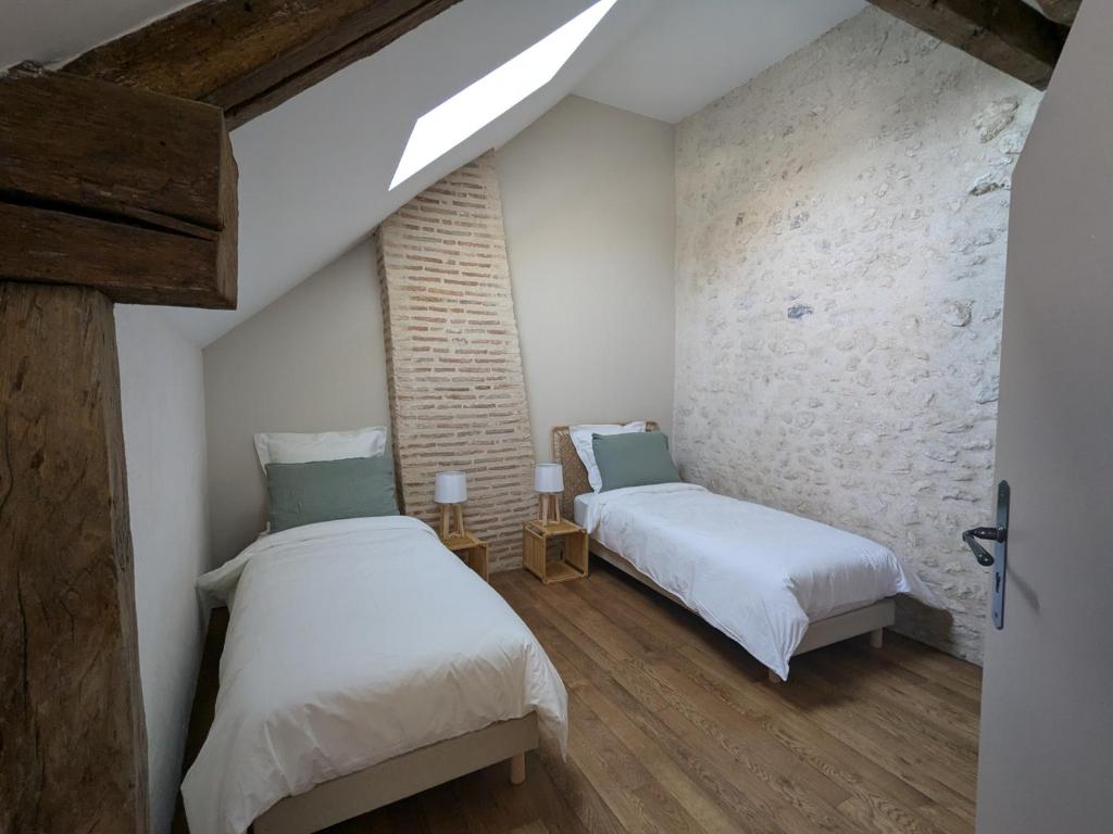 Postel nebo postele na pokoji v ubytování La Sourcière Beaugency