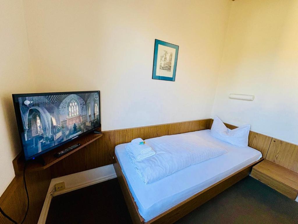 Postel nebo postele na pokoji v ubytování Lessinghof