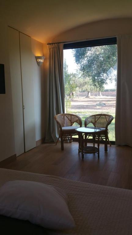 Posteľ alebo postele v izbe v ubytovaní Masseria Le Celline