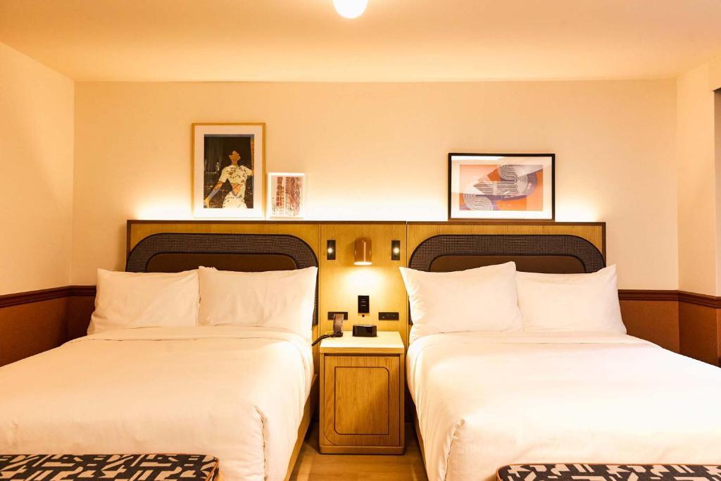 Giường trong phòng chung tại Union Hotel