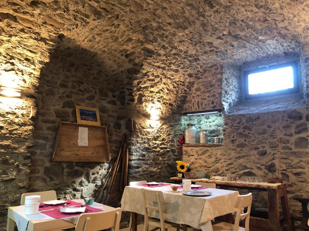 TV a/nebo společenská místnost v ubytování B&B Casa Taralin