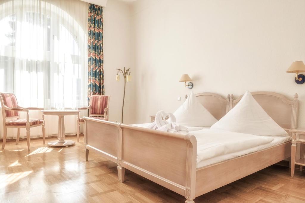 Postel nebo postele na pokoji v ubytování Augustenhof