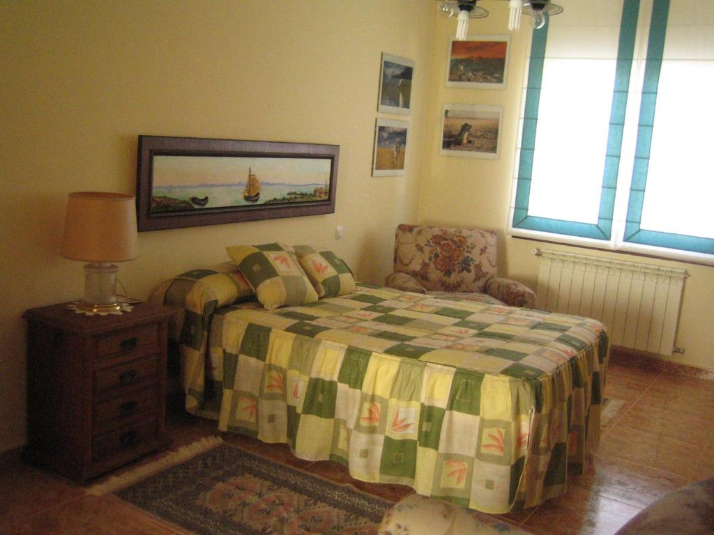 Postel nebo postele na pokoji v ubytování Casa Doña Julia
