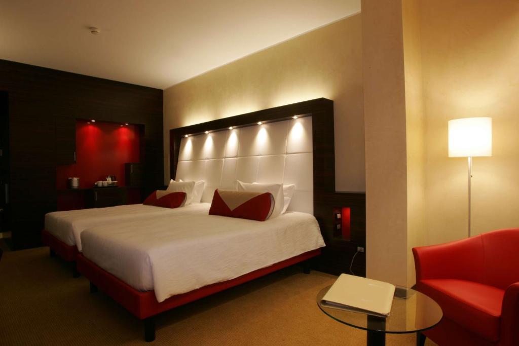 Postel nebo postele na pokoji v ubytování Hilton Garden Inn Lecce