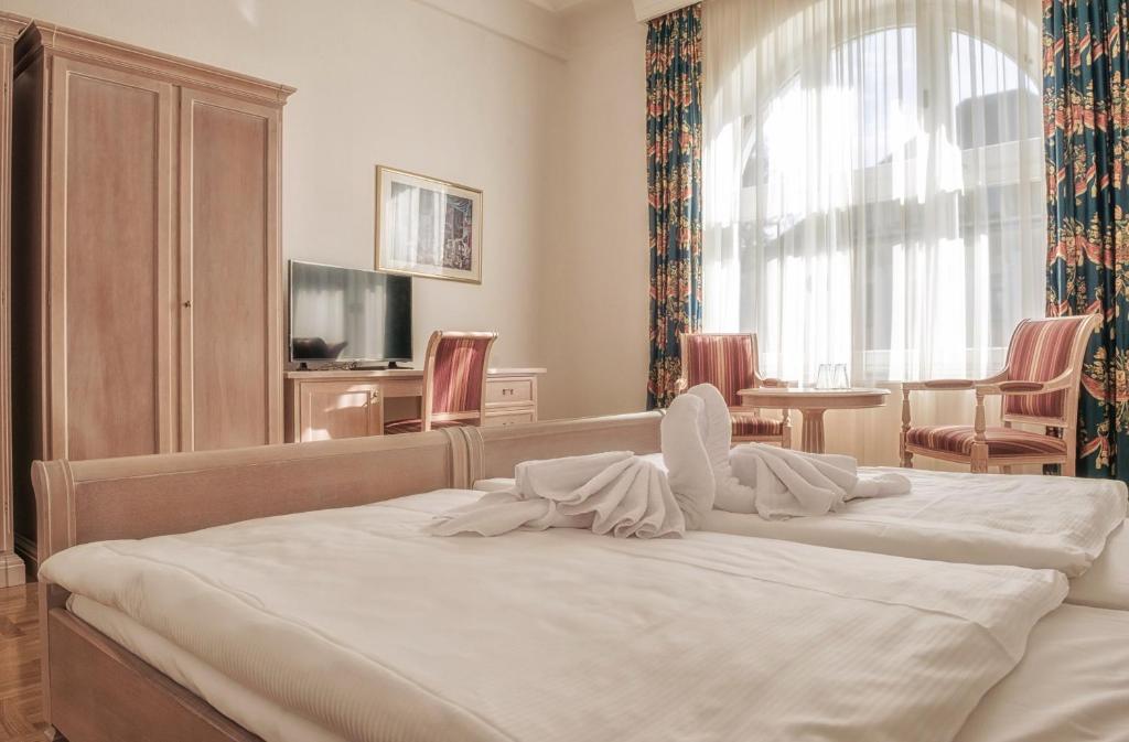 Postel nebo postele na pokoji v ubytování Augustenhof