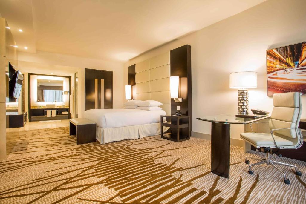 Postel nebo postele na pokoji v ubytování Hilton Panama