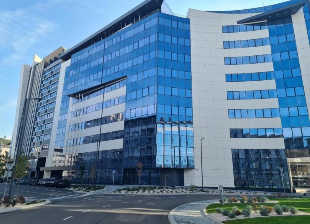 a large office building with a lot of windows at Royal apartman Banja Luka in Banja Luka