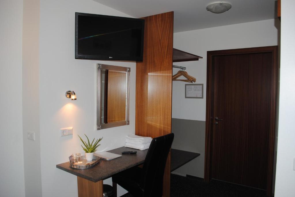 TV a/nebo společenská místnost v ubytování Brunnholl Country Guesthouse