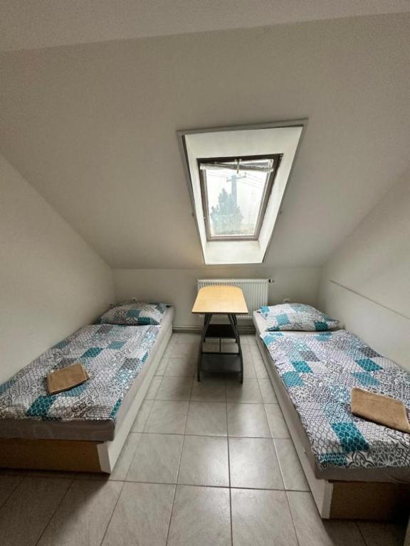 Postel nebo postele na pokoji v ubytování Penzion Pod sklepy