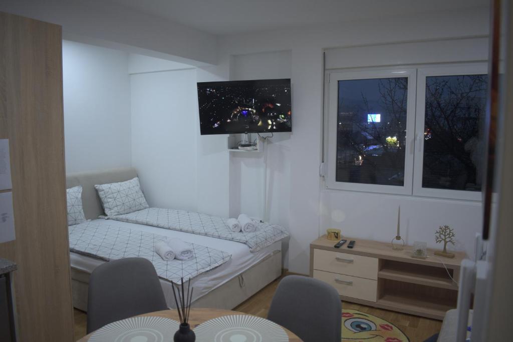 Postel nebo postele na pokoji v ubytování Studio apartman Delight Vrnjačka banja