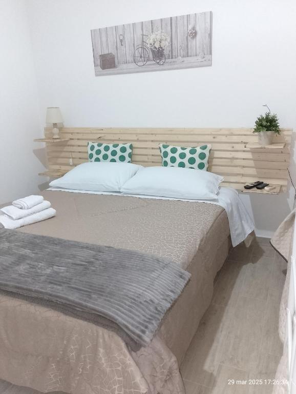 A bed or beds in a room at L'antico borgo