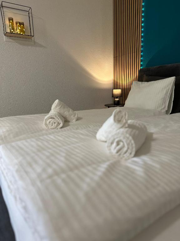 Postel nebo postele na pokoji v ubytování Stilvoll, am Thuner See, nähe Interlaken, Familienfreundlich mit Garten, WIFI