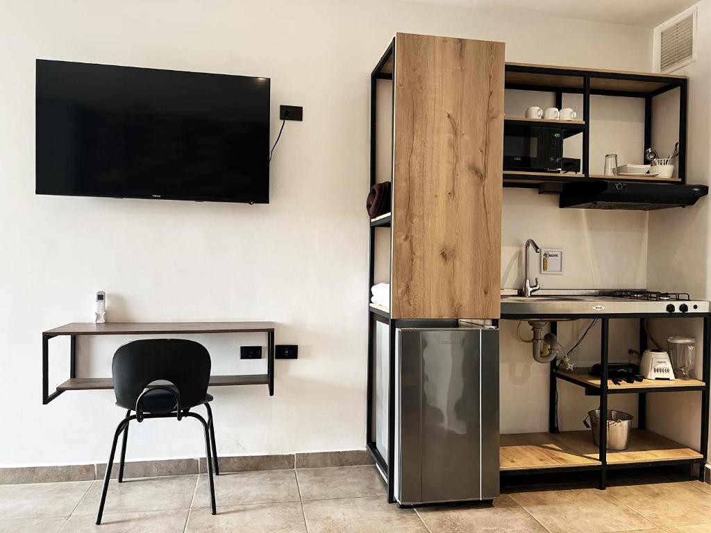 Kuchyň nebo kuchyňský kout v ubytování Apartahotel con Piscina