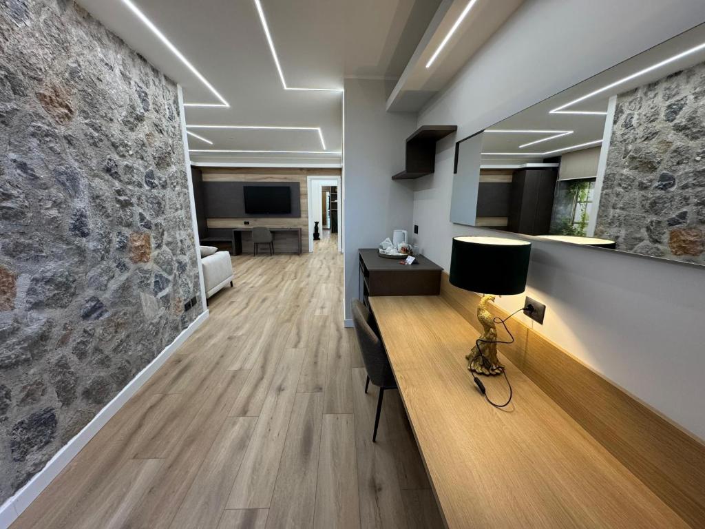 Telewizja i/lub zestaw kina domowego w obiekcie La Locanda Del Pontefice - Luxury Country House