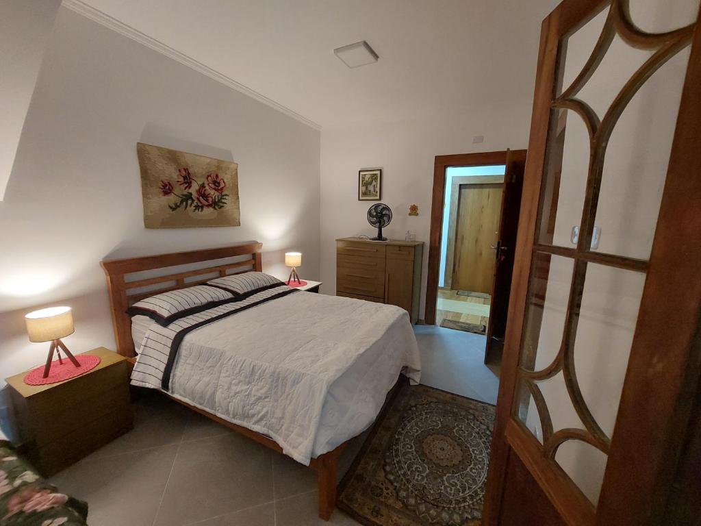 Katil atau katil-katil dalam bilik di Pousada Casa da Praça