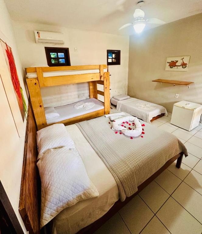 Cama o camas de una habitación en Jeri Kite Surf Pousada