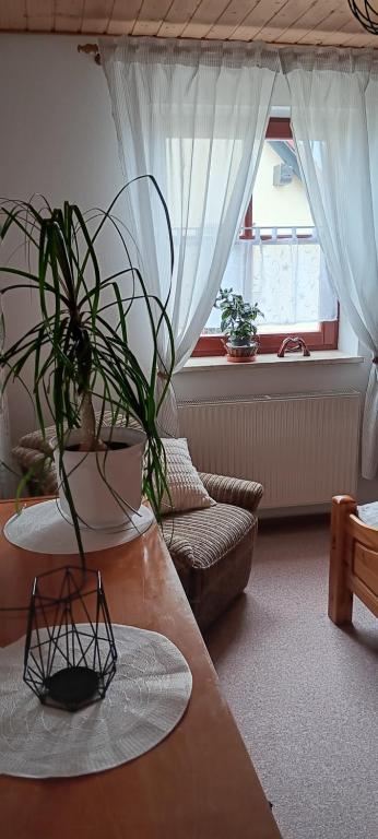 Posezení v ubytování Ferienhaus Töpferblick-Hartau