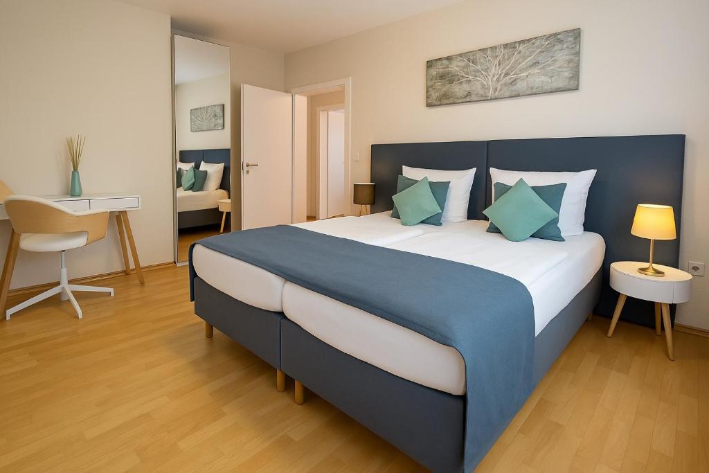 Postel nebo postele na pokoji v ubytování Hotel Schultheiss Hameln