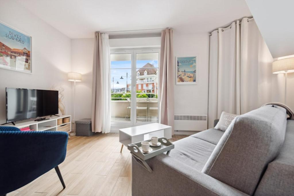 TV a/nebo společenská místnost v ubytování Le Coeur du Port Guillaume 4 pers