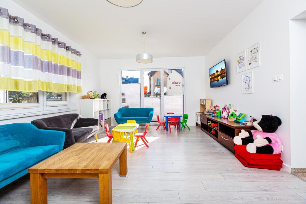 Posedenie v ubytovaní Malta Apartamenty - 200m do Plaży - Komfort i Wygoda dla Całej Rodziny
