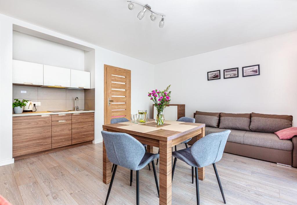 Kuchyňa alebo kuchynka v ubytovaní Malta Apartamenty - 200m do Plaży - Komfort i Wygoda dla Całej Rodziny