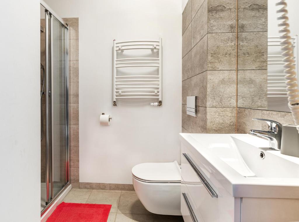 Kúpeľňa v ubytovaní Malta Apartamenty - 200m do Plaży - Komfort i Wygoda dla Całej Rodziny