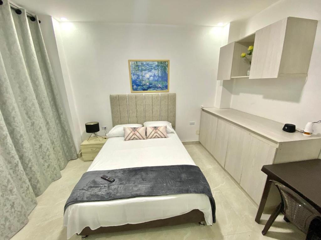 Postel nebo postele na pokoji v ubytování Perla del río habitaciones