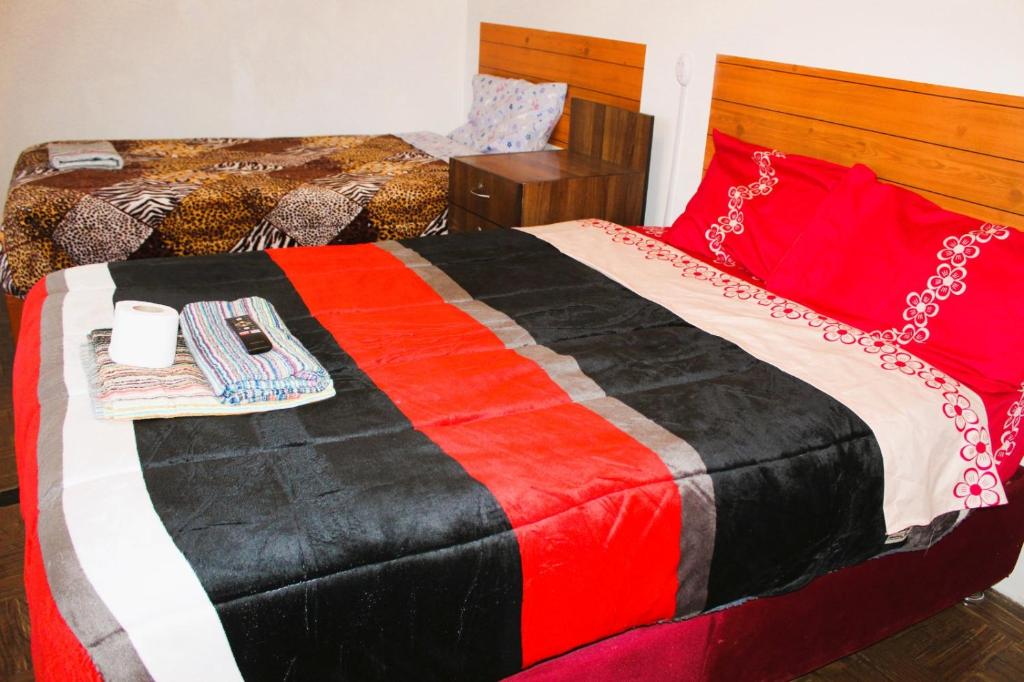Postel nebo postele na pokoji v ubytování Posada Escondida
