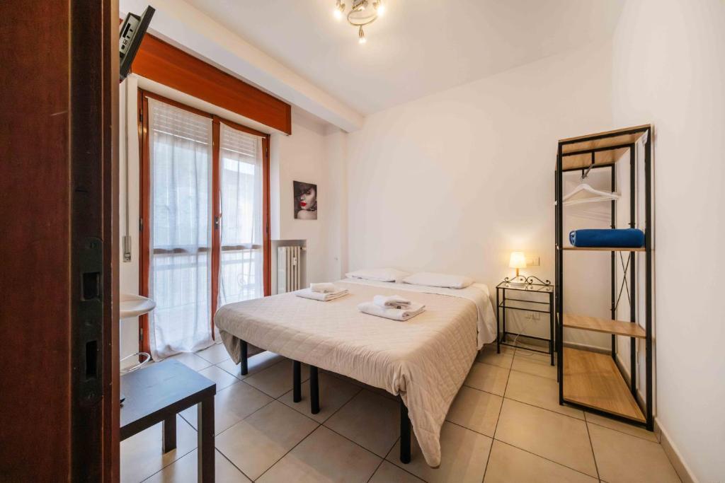 Postel nebo postele na pokoji v ubytování GuestHouse127