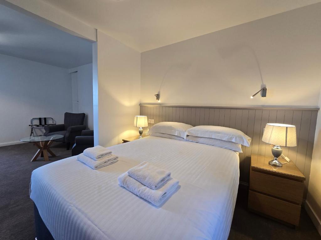 Postel nebo postele na pokoji v ubytování Carnaburg Guesthouse
