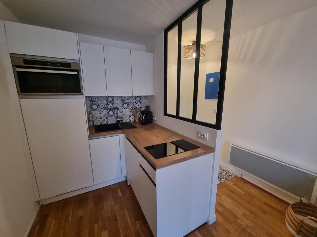 Front de mer, WIFI, très joli et moderne appt 1 chambre, 4 couchages, Palm Beach