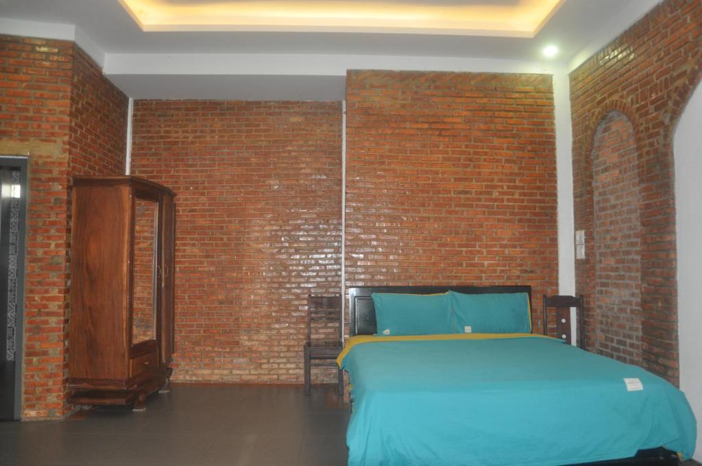 Postel nebo postele na pokoji v ubytování Autumn Bay Retreat Hoi An