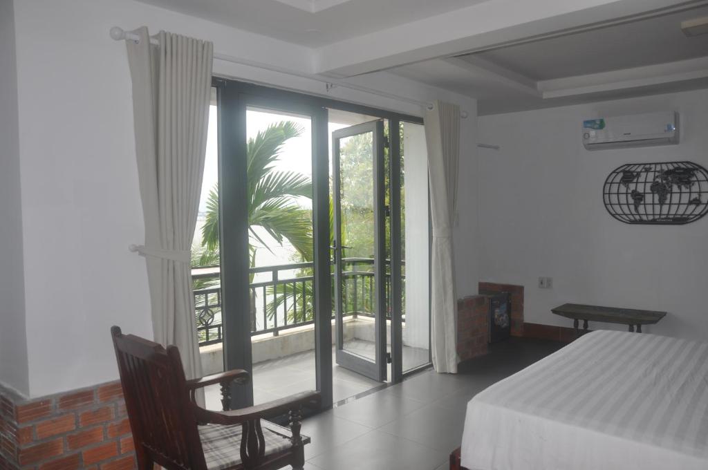 Postel nebo postele na pokoji v ubytování Autumn Bay Retreat Hoi An