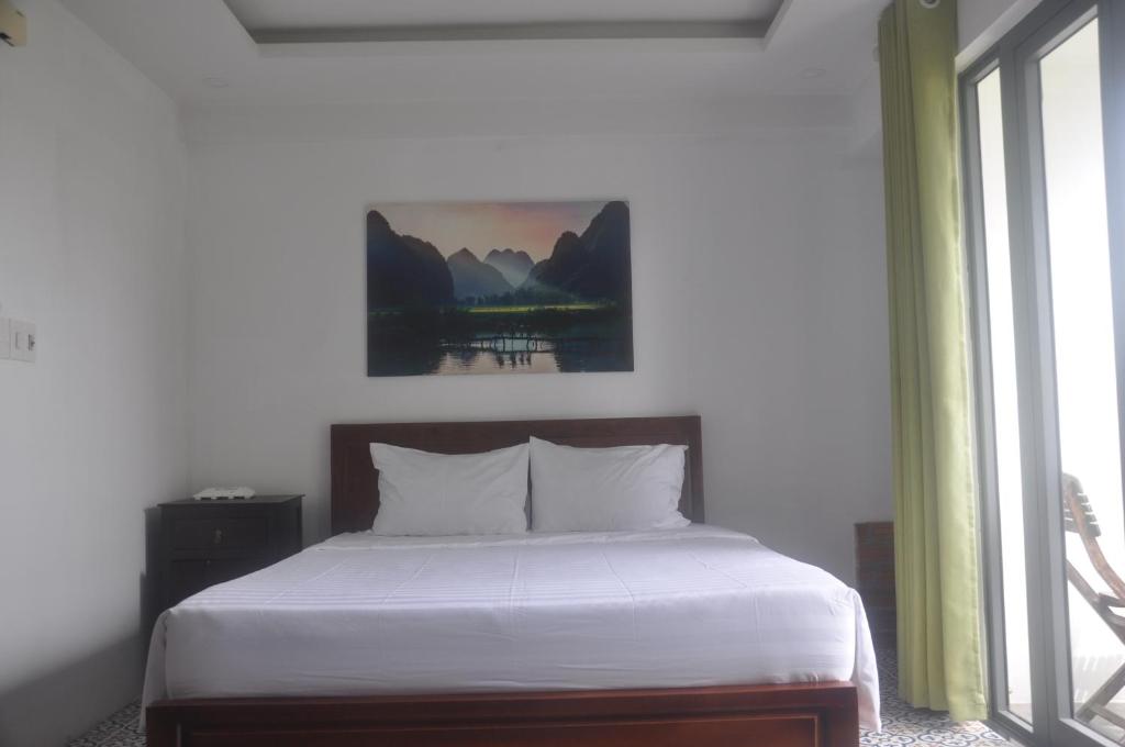 Postel nebo postele na pokoji v ubytování Autumn Bay Retreat Hoi An