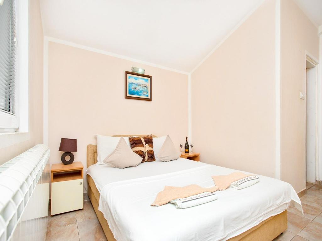 Postel nebo postele na pokoji v ubytování Apartments MIK5 - Famous Beach Jaz