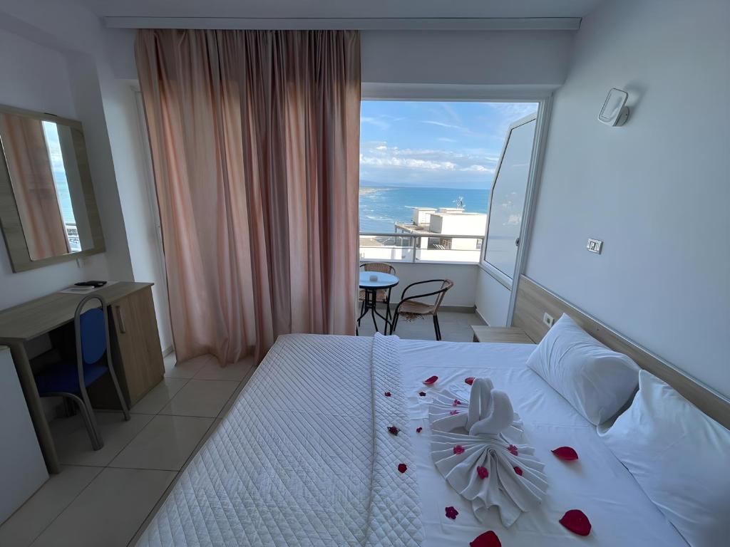 Letto o letti in una camera di Rosa Negra