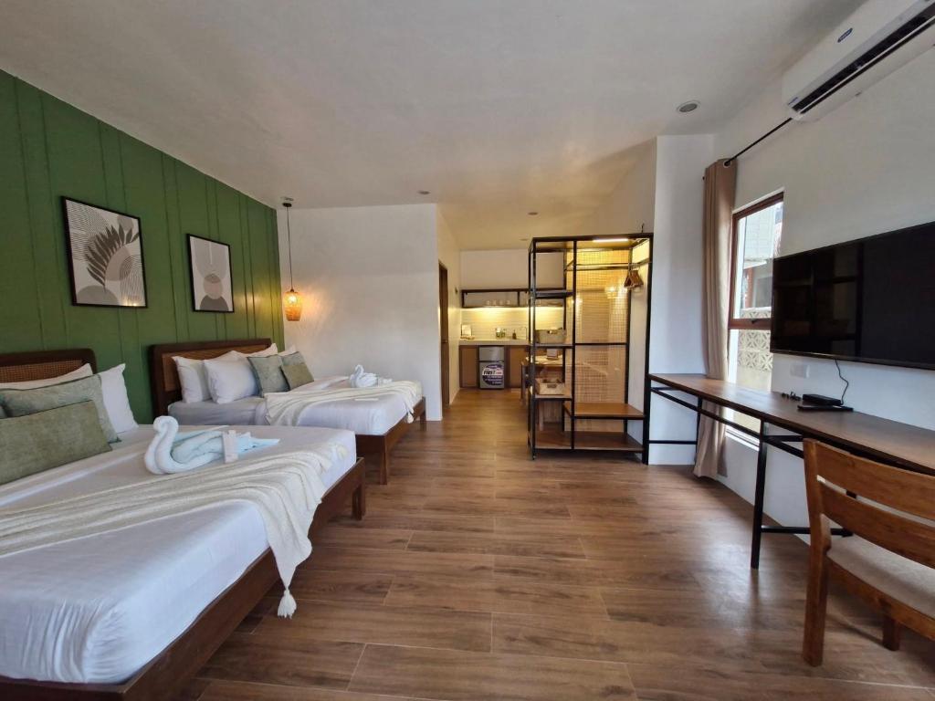 Postel nebo postele na pokoji v ubytování Villa Alessandra Homestay