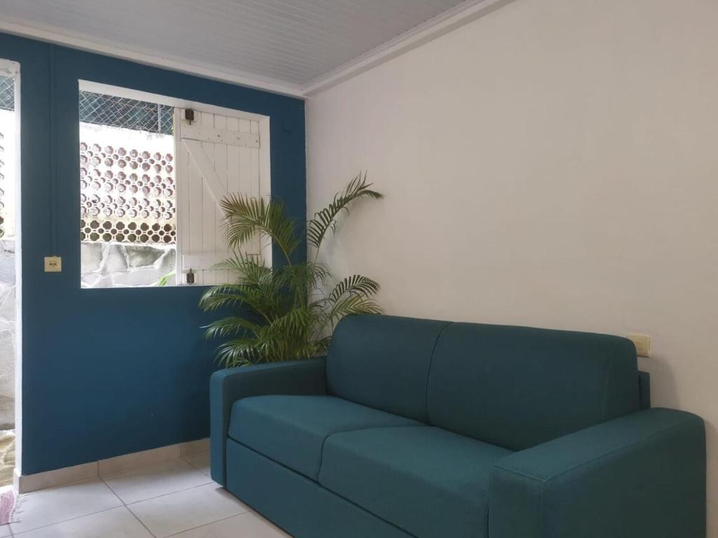 Posezení v ubytování Le cocotier bleu