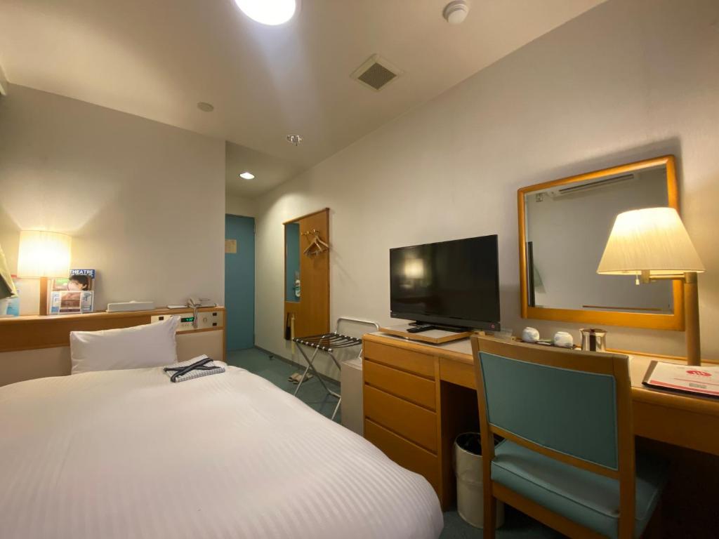 Postel nebo postele na pokoji v ubytování Hotel Tateshina