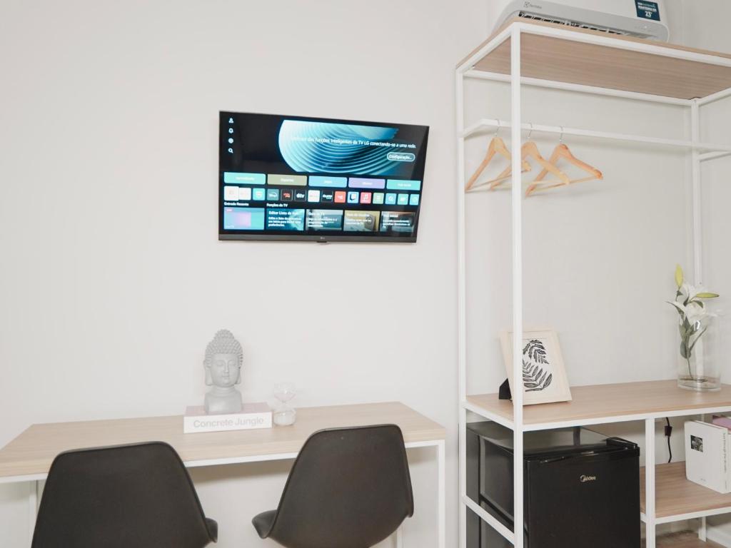TV a/nebo společenská místnost v ubytování Apê Santos Praia do Gonzaga