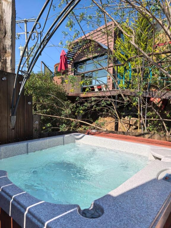 a swimming pool in the middle of a yard at Chalet Contenedor con Hot Tub exterior exclusivo in Las Palmas