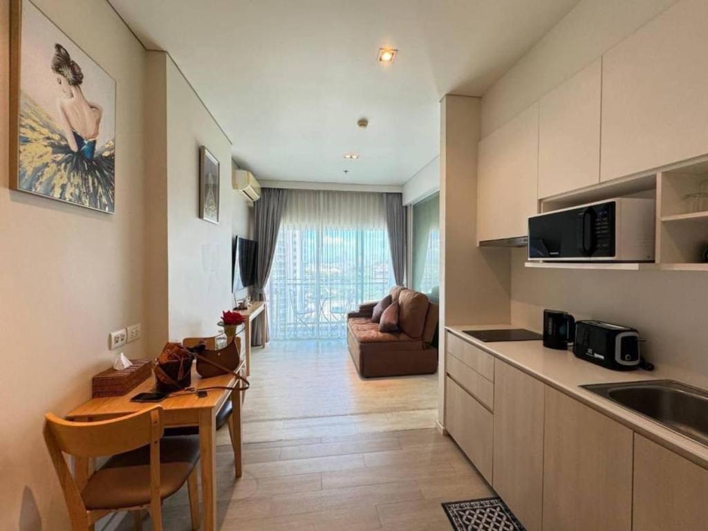 Kuchyň nebo kuchyňský kout v ubytování Luxury Seaview Condo