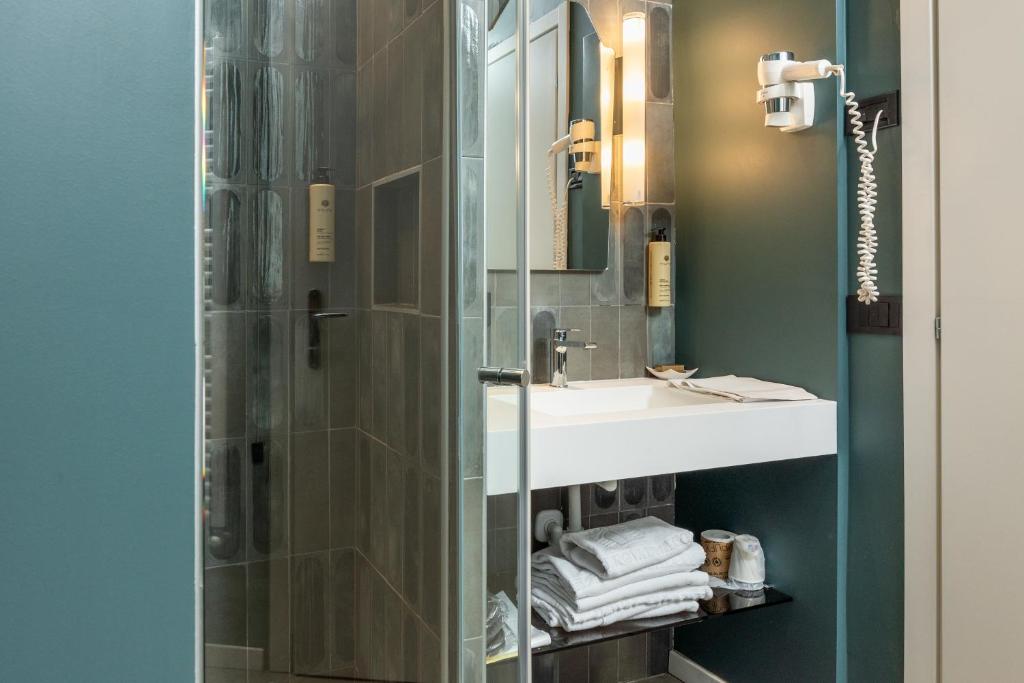 Koupelna v ubytování Hotel Royal Falcone