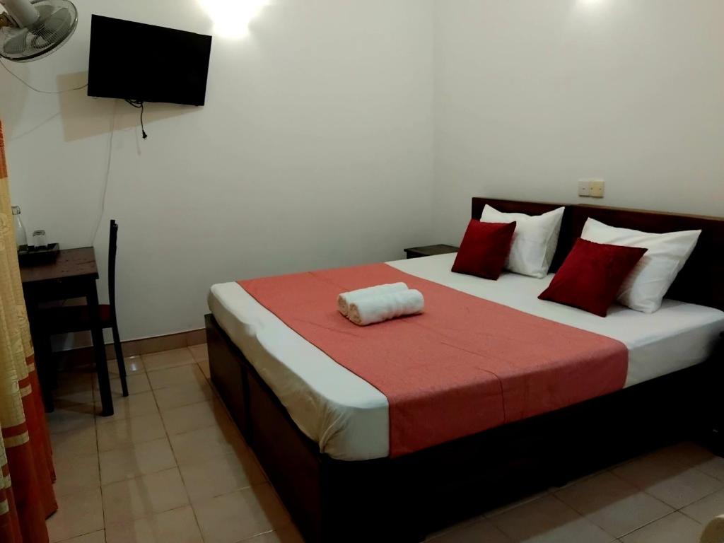 Postel nebo postele na pokoji v ubytování Paradise Residence Hanthana