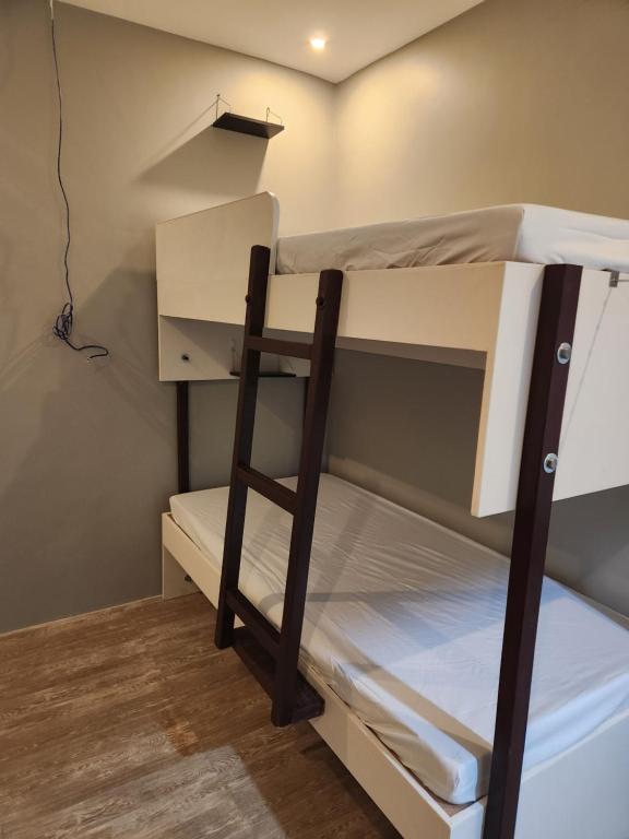 Postel nebo postele na pokoji v ubytování YES Guesthouse