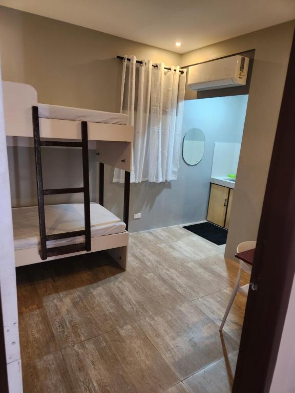 Postel nebo postele na pokoji v ubytování YES Guesthouse