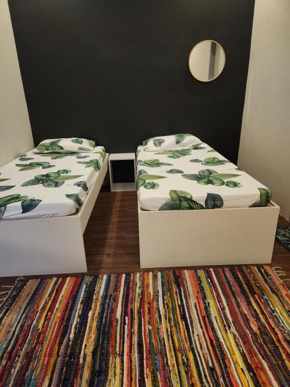 Postel nebo postele na pokoji v ubytování YES Guesthouse