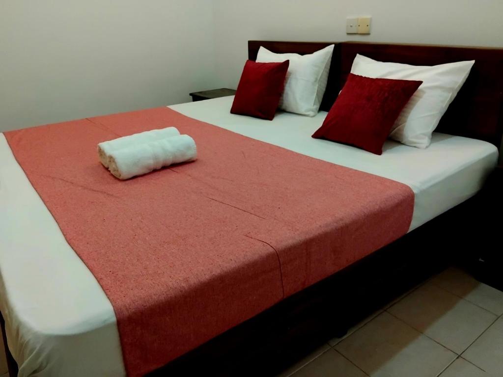 Postel nebo postele na pokoji v ubytování Paradise Residence Hanthana